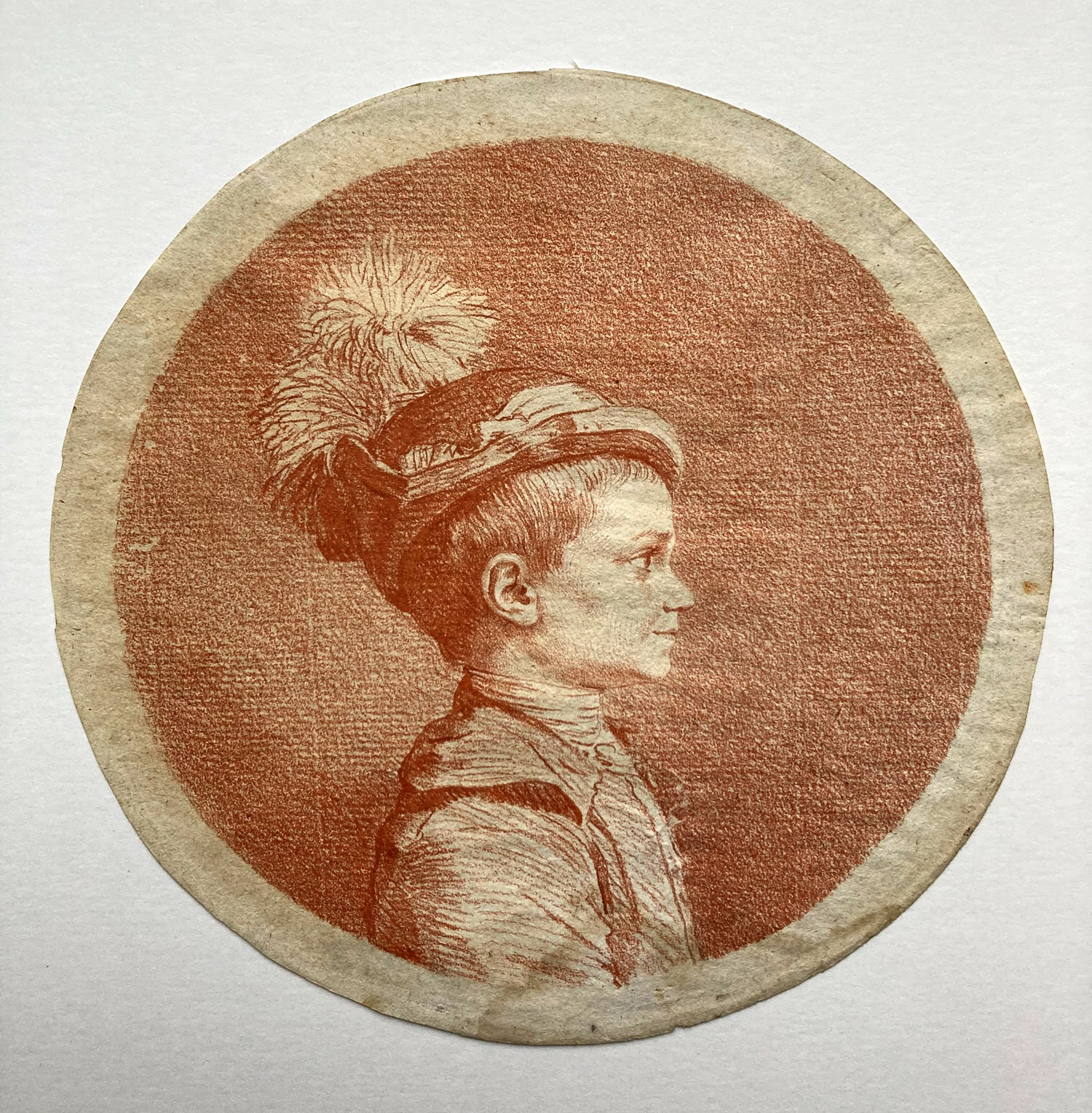 Jean Florent Defraine: Retrato de niño. Ca. 1777. Sanguina sobre papel verjurado, 170 mm de diámetro. Inv. 10073. Museo Lázaro Galdiano